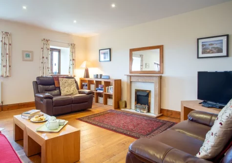 The living area at Munnings Barn at Tregurnow Farm, Lamorna
