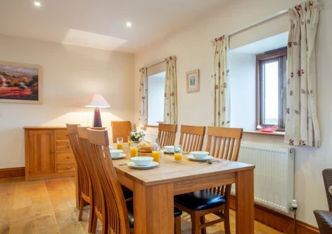 The dining area at Munnings Barn at Tregurnow Farm, Lamorna