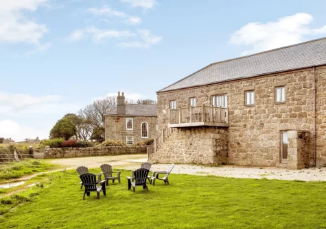 The shared lawn at Munnings Barn at Tregurnow Farm, Lamorna