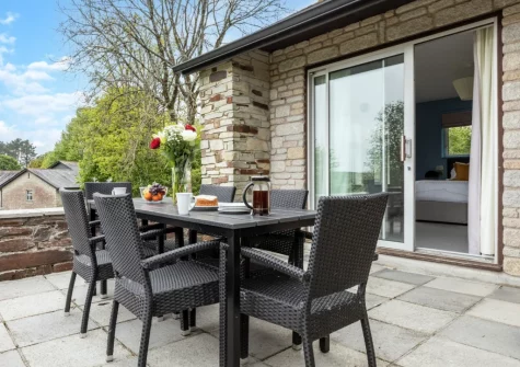 The patio & alfresco dining area at Nampara 17, St Mellion Estate, St Mellion