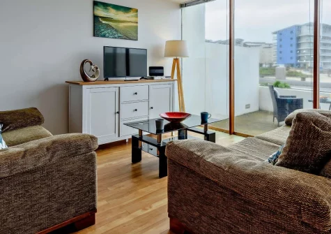 Nautilus Sea View, Westward Ho! is a stylish one-bedroom seafront apartment in a truly unrivalled coastal setting. Enjoy open-plan living, floor-to-ceiling sea views, a private patio, and two miles of golden sands right on the doorstep.