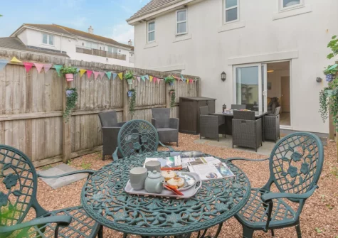 The outdoor sitting, alfresco dining area & courtyard garden at Nelson View, Westward Ho!