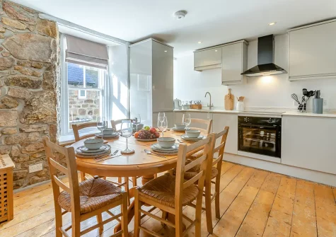 The kitchen & dining area at Neptune Cottage, St Ives