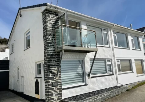 Neptune House is a reverse-level cottage designed to make the most of the breathtaking views over Mount's Bay