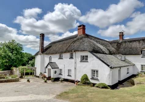 Nethercott Manor is a wing of a 17th-century farmhouse surrounded by rolling countryside