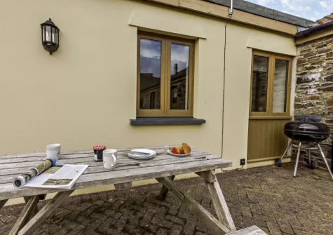 The patio, barecue & alfresco dining area at Netherdowns Shippon, Weare Giffard