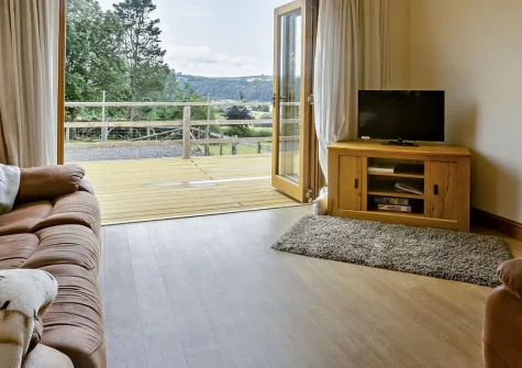 Netherdowns Shippon, Weare Giffard is a charming barn conversion nestled on a 200-acre farm with river views. Enjoy cosy comfort and easy access to North Devon's finest beaches and family attractions for unforgettable countryside breaks.