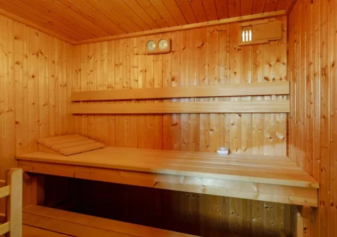 Bedroom #1 en-suite sauna at Newhaven Cabin, Branscombe