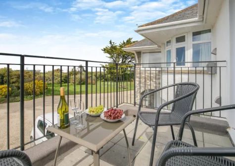 The balcony & outdoor sitting area at Newland, St Merryn