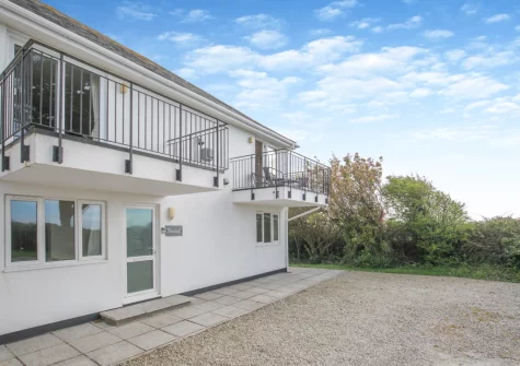 Newland is a lovely, reverse-level apartment within a large house set amongst stunning rolling countryside
