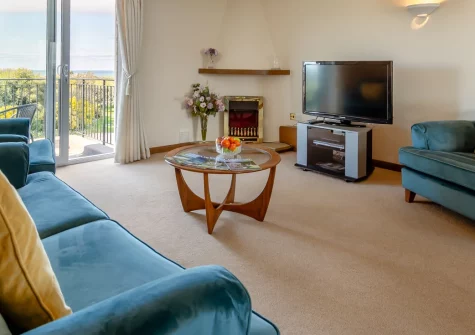 Newland, St Merryn is a charming reverse-level apartment set amid rolling countryside near St Merryn, featuring a private balcony with sea views, spacious entertaining areas, and easy access to Padstow's harbour and the stunning Seven Bays beaches.