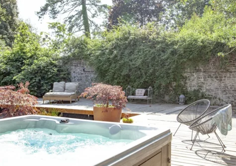 The hot tub & secluded decked area at Newton House, Newton Tracey