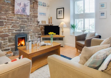Nigel House, Mousehole is a characterful cottage in the heart of this enchanting fishing village, featuring a cosy wood burner, peaceful snug with sea views, original Cornish features, and the picturesque harbour just steps from your door.