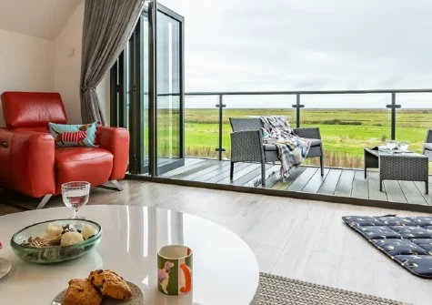 No.36 By The Beach, Westward Ho! is a stunning four-bedroom reverse-level home with spectacular panoramic sea views, contemporary interiors, and enclosed garden. Perfect for families seeking coastal adventures and unforgettable seaside escapes.