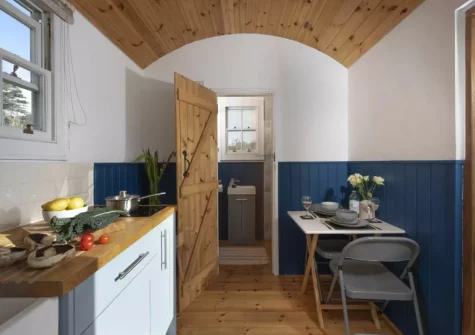 The kitchen & dining area at Nori's Nest Shepherds Hut at Croft Hooper, Crowlas
