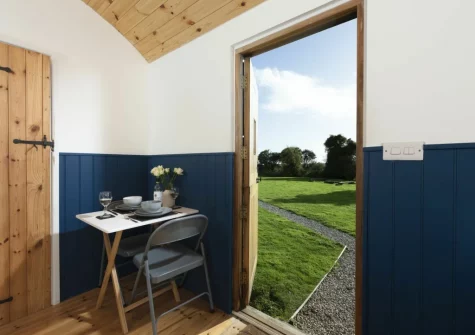The dining area at Nori's Nest Shepherds Hut at Croft Hooper, Crowlas