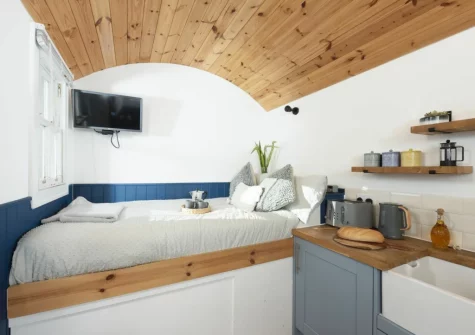The kitchen & sleeping area at Nori's Nest Shepherds Hut at Croft Hooper, Crowlas