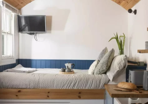 The sleeping area at Nori's Nest Shepherds Hut at Croft Hooper, Crowlas