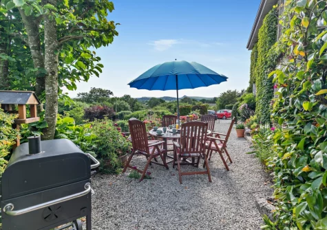 The barbecue & alfresco dining area at North Coombe Farm, Rilla Mill