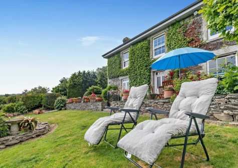 The garden & outdoor sitting area at North Coombe Farm, Rilla Mill