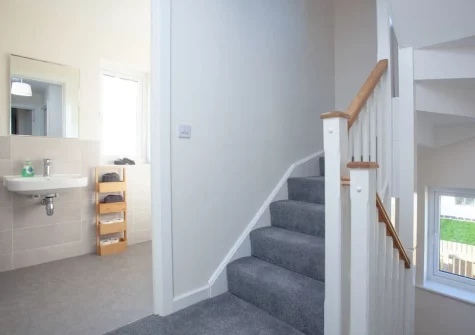 The bathroom & first floor landing at Number 11, St Eval