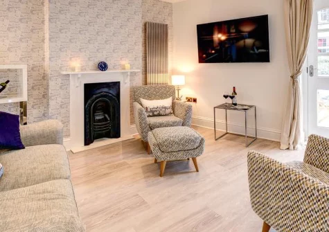 Number 19, Dartmouth is a stylish two-bedroom townhouse nestled in the heart of this historic harbour town, boasting a private roof terrace with pretty town and river views, elegant modern interiors, and effortless access to the South Devon coast.