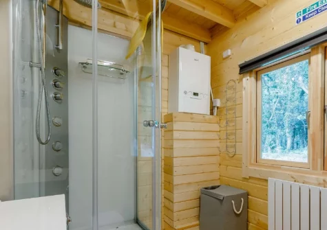 The shower room at Oak Cabin at Hilton Wood, Whitstone