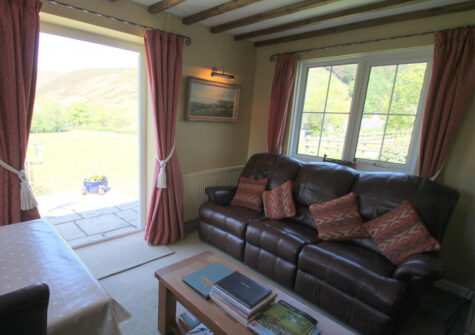 The living area at Oare Water Cottage, Oare