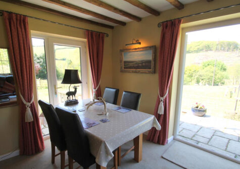 The dining area at Oare Water Cottage, Oare