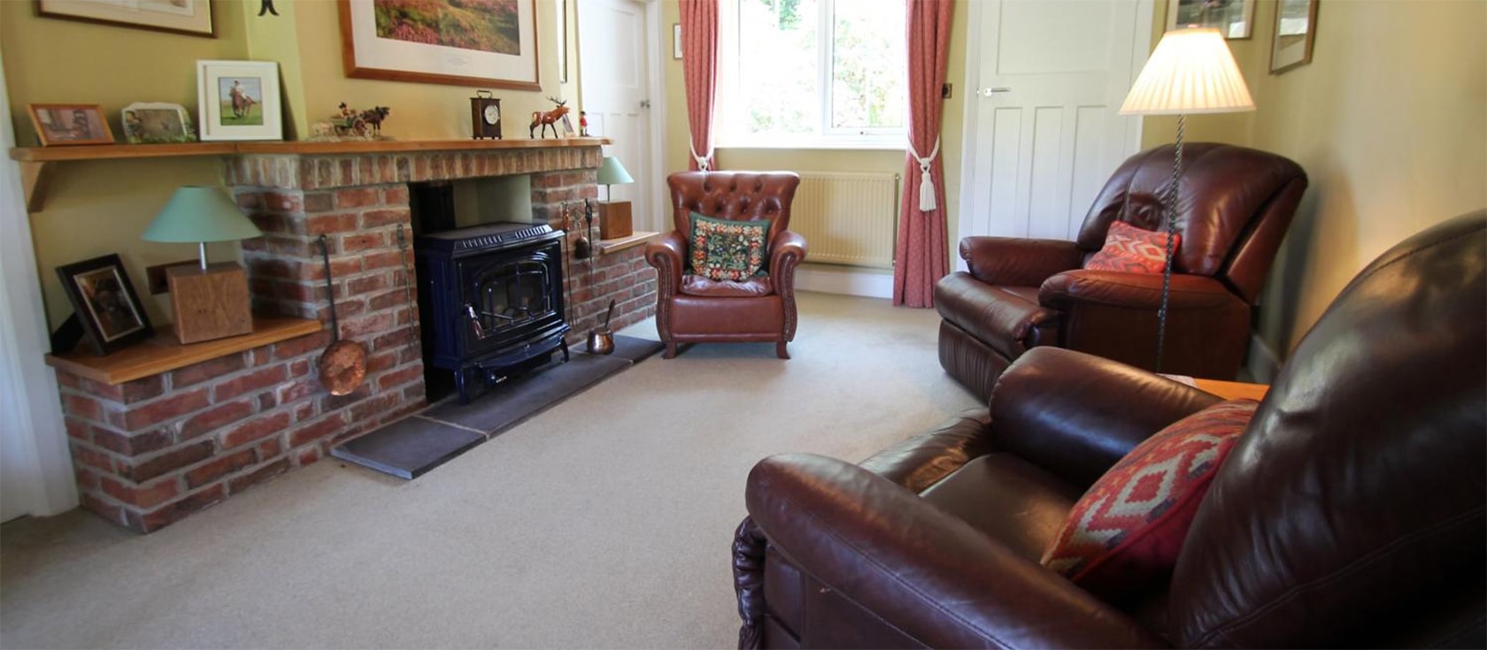 Oare Water cottage, Oare is a secluded two bedroom, two bathroom bungalow on Exmoor with spacious living room, sun room & fully equipped kitchen. Enclosed garden & furnished terrace with superb moorland views. Walk to riverside pub.