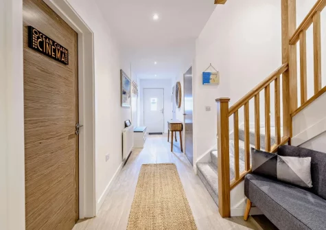 The entrance hallway & stairs up to the first floor at Ocean Charm, Westward Ho!