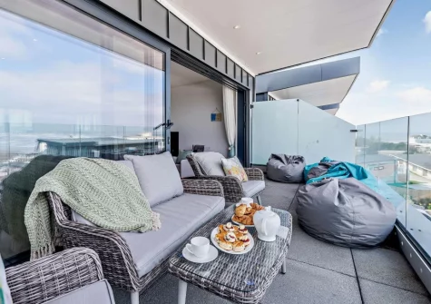 The balcony & outdoor sitting area at Ocean Charm, Westward Ho!