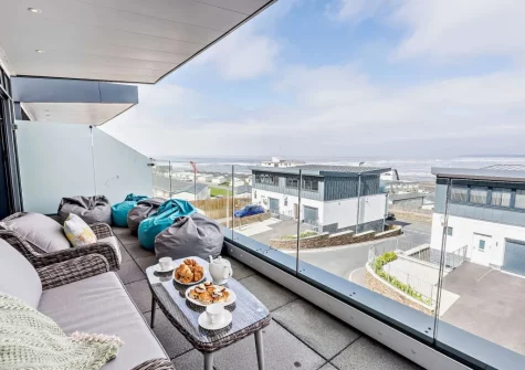 The balcony & outdoor sitting area at Ocean Charm, Westward Ho!