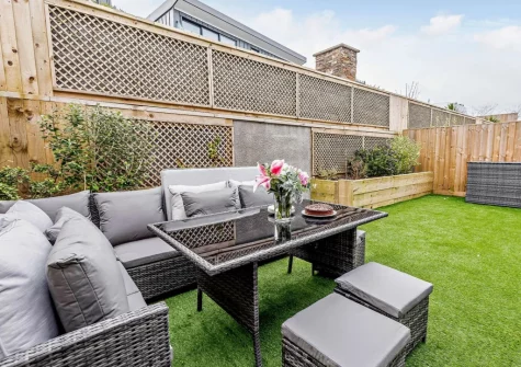 The garden & alfresco dining area at Ocean Charm, Westward Ho!
