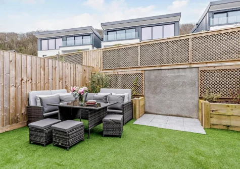 The garden & alfresco dining area at Ocean Charm, Westward Ho!
