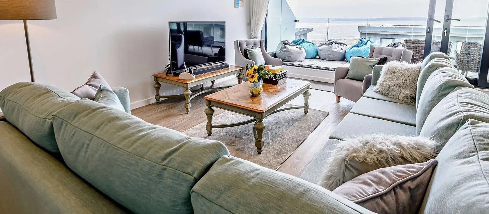 Ocean Charm, Westward Ho! is a luxurious five-bedroom coastal retreat featuring extraordinary sea views across to Lundy Island, private hot tub, cinema room, and offering direct beach access. Perfect for creating unforgettable family holidays.