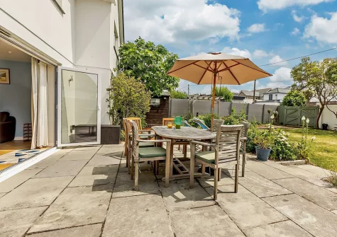 The patio, alfresco dining area & garden at Ocean Echo, Bude