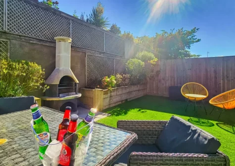 The barbecue, alfresco dining area & garden at Ocean Escape, Westward Ho!