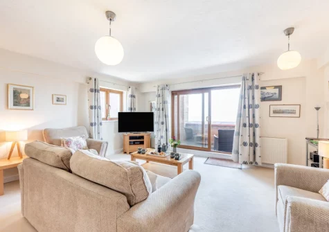 The living area at Ocean Park 16, Westward Ho!