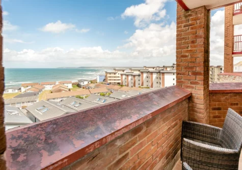 The balcony & outdoor sitting area at Ocean Park 16, Westward Ho!