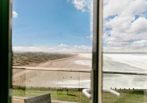 The beach & sea view from bedroom #1 at Ocean Point, Saunton