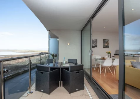 The balcony & alfresco dining area at Ocean Serenity, Westward Ho!