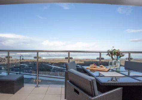 The balcony & alfresco dining area at Ocean Serenity, Westward Ho!