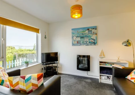 The living area at Ocean View at Brixham Holiday Park, Brixham