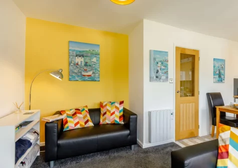 The living area at Ocean View at Brixham Holiday Park, Brixham