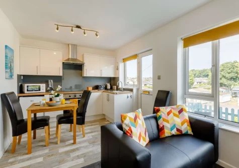 The living, dining area & kitchen at Ocean View at Brixham Holiday Park, Brixham