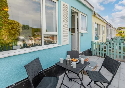 The terrace & outdoor sitting area at Ocean View at Brixham Holiday Park, Brixham