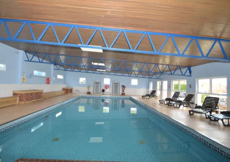 The shared indoor heated swimming pool at Ocean View at Brixham Holiday Park, Brixham