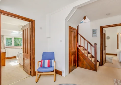 The hallway & stairs up to the first floor at Ocean View, Holywell