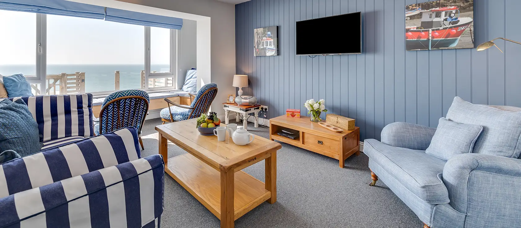 Ocean View, Porthleven is a luxurious three-bedroom coastal cottage with spectacular panoramic sea views from every room. Enjoy a private master balcony, enclosed garden, and prime location near the picturesque harbour with restaurants and beaches.